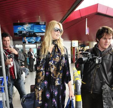 Claudia Schiffer arriving at Tegel Airport after flying in from London for the Vogue Berlin Fashion Night Out. Berlin.