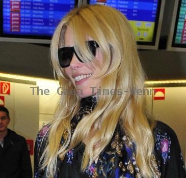 Claudia Schiffer arriving at Tegel Airport after flying in from London for the Vogue Berlin Fashion Night Out. Berlin.