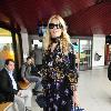 Claudia Schiffer arriving at Tegel Airport after flying in from London for the Vogue Berlin Fashion Night Out. Berlin.