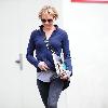 Renee Zellweger running errands in Santa Monica wearing zip-up fleece and sweats. Los Angeles.