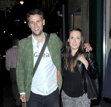 Richard Bacon wearing  a green jacket, out and about in Soho with his wife Rebecca McFarlane 
London, England.