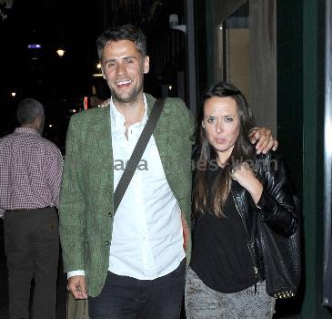 Richard Bacon wearing  a green jacket, out and about in Soho with his wife Rebecca McFarlane 
London, England.