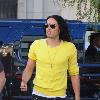 Russell Brand arrives at the Graumans Theater in Hollywood to attend the premiere of 'Legend of the Guardians The Owls of Ga'Hoole'
Brand was arrested earlier in the week on suspicion of battery after allegedly attacking a group of paparazzi at LAX Airport 
Los Angeles, USA.