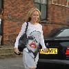 Kylie Minogue wearing a striking graphic print dress London.