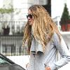 Elle Macpherson takes her children to school London.