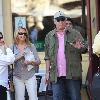 Chevy Chase and Jayni Lukefilming an interview for the entertainment television news programme �Extra� at The Grove in Hollywood. Los Angeles.