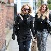 Kylie Minogue leaving the offices of her management company. London.