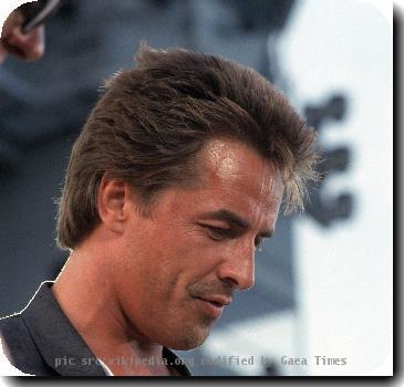 Actor Don Johnson answers questions during a press conference held aboard the training aircraft carrier USS LEXINGTON (AVT 16) during the celebration of the 75th anniversary of naval aviation.  Location Naval Air Station, Pensa