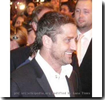 Gerard Butler Arrives at RocknRolla Premiere for Tiff