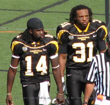 Armanti Edwards (#14) and Pierre Banks (#31) walking onto the field after halftime versus The Citdel.