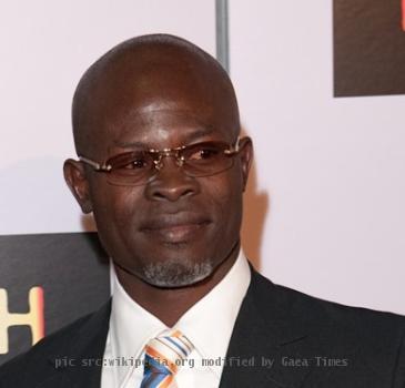 Beninese actor Djimon Hounsou and American fashion model Kimora Lee Simmons arrive at the premiere of