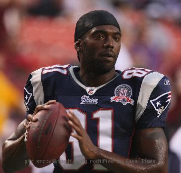 Randy Moss #81 of the New England Patriots before a preseason game against the Washington Redskins at FedExField on August 28, 2009 in Landover, Maryland.