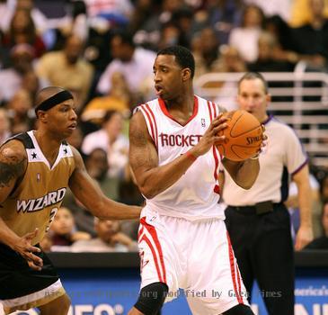 Tracy McGrady playing against the Washington Wizards of the National Basketball Association, guarded by Caron Butler