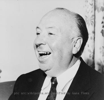Alfred Hitchcock, head-and-shoulders portrait, facing left