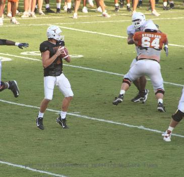 College football game - 2006 fall scrimmage of University of Texas at Austin - UT quarterback Jevan Snead drops back to pass