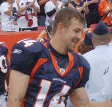 Denver Broncos receiver Brandon Stokley, 14, greets members of the Peterson contingent after the halftime celebration at Invesco Field at Mile High in Denver Sept. 16. There were 25 Airmen from Peterson selected to take part in