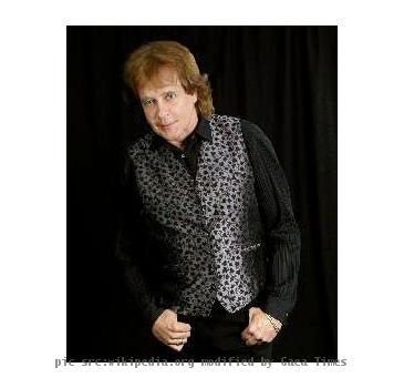 This is a cropped, shrunken, and slightly retouched version of an Eddie Money publicity photo supplied by his publicist.