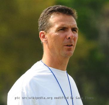 University of Florida football Head Coach Urban Meyer watches his team practice during the Gators