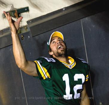 Green Bay Packers starting quarterback Aaron Rodgers runs off Lambeau Field into the tunnel amid a standing ovation.