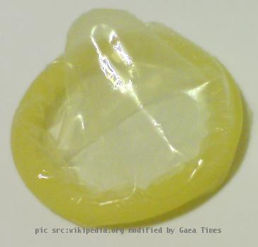 Photograph showing rolled up condom