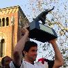 Leinart holding his Heisman trophy at USC