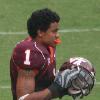 Macho Harris and Cam Martin of the Virginia Tech Hokies walk onto the field
