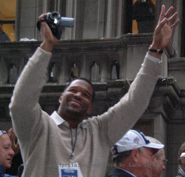 Michael Strahan during a post superbowl parade.