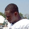 Lehigh, Pa. (Aug. 11, 2005) - Storekeeper 1st Class Washington Jaramillo assigned to Navy Recruiting District Philadelphia gets an autograph from Philadelphia Eagles cornerback Lito Sheppard during the team