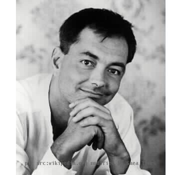 Portrait of the subject (singer-songwriter) of the article. Likely a promotional photograph by the recording label.