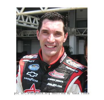 Max Papis posing with a fan at the 2008 NASCAR Nationwide Series event at Mexico City