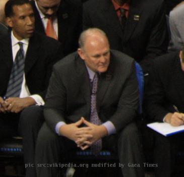 Denver Nuggets primary logo and the Nuggets bench, including head coach George Karl.