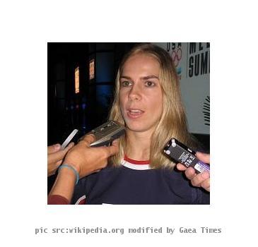 Jenny Potter talks to reporters during US Women