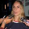 Jenny Potter talks to reporters during US Women