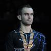 Kevin VAN DER PERREN on the podium at the 2009 European Figure Skating Championships