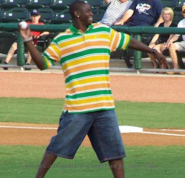 Ronnie Brewer throwing out the first pitch at a Northwest Arkansas Naturals game