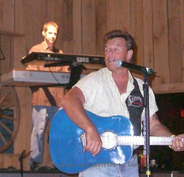 Sammy Kershaw onstage, with pianist Steve Farmer