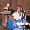 Sammy Kershaw onstage, with pianist Steve Farmer