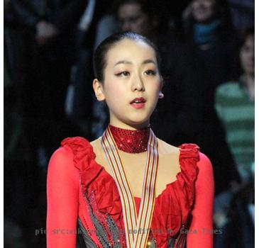 Mao Asada (JPN) during the medals ceremony at the 2010 World Figure Skating Championships. She won the gold medal