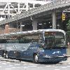 Greyhound Lines Prevost X3-45 #8879, repainted into the latest livery, departs New York City on Schedule 8535.