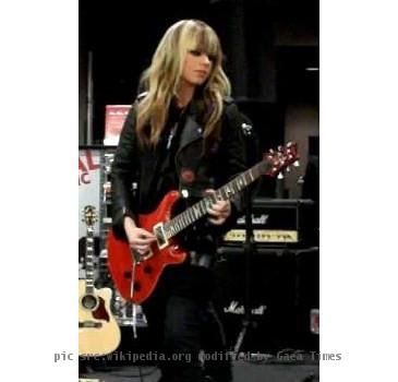 Orianthi performing live