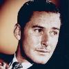 
This image shows a photograph of Errol Flynn, taken ca. 1940. Under Australian law, all photographs taken in Australia before 1955 are in the public domain. This image is in the public domain under both Australian copyright la