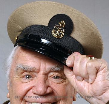 Academy Award winner and actor Ernest Borgnine shows off his new Chief Petty Officer (CPO) cover at the United States Navy Memorial in Washington, District of Columbia (DC). Mr. Borgnine was made an honorary US Navy (USN)