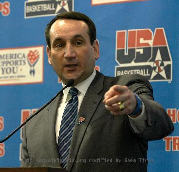 Mike Krzyzewski, USA Basketball National Team head coach, speaks to servicemembers’ children at the Pentagon Athletic Center during the "Hoops for Troops" program April 6, 2006. USA Basketball joined the America Suppor