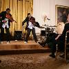 President George W. Bush and guests watch violinists Tourie and Damien Escobar of Nuttin’ But Stringz, as they perform Friday, June 22, 2007 in the East Room of the White House, in celebration of Black Music Month.