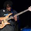 Victor Wooten playing his bass guitar at the