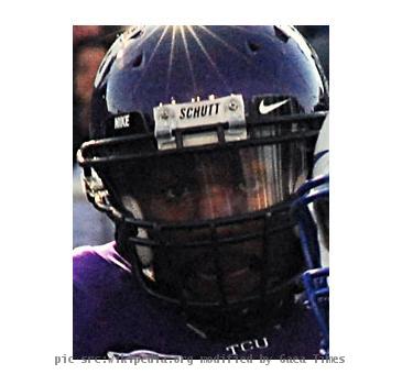Air Force Falcon quarterback Tim Jefferson is chased out of the pocket by Texas Christian University defensive end