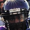 Air Force Falcon quarterback Tim Jefferson is chased out of the pocket by Texas Christian University defensive end