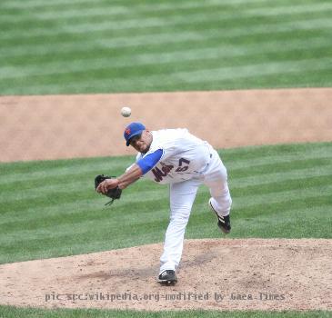 Johan Santana of the New York Mets pitches against the San Diego Padres on August 7th, 2008 in a Major League Baseball game at Shea Stadium.