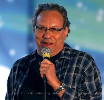 AVIANO AIR BASE, Italy-- Comedian Lewis Black performs as part of a USO holiday show held for the Aviano community, Dec. 22, 2007. Navy Adm. Michael G. Mullen, chairman of the Joint Chiefs of Staff, arrived in Aviano early Satur