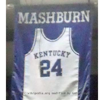 A jersey honoring Jamal Mashburn hangs in Rupp Arena